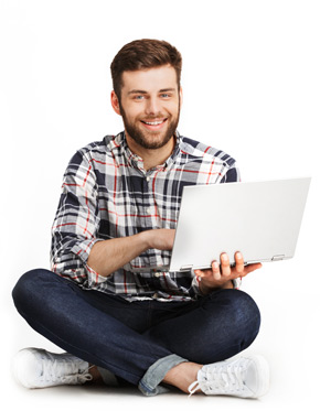 smiling man on laptop